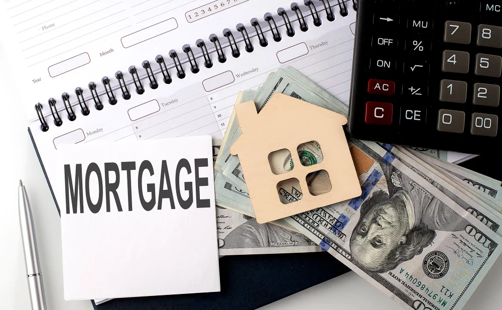 mortgage-inscription-text-sticker-planning-with-dollars-calculator